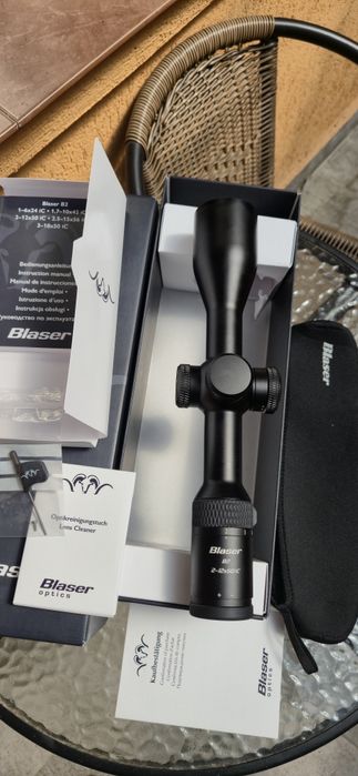 Luneta B.l.a.s.e.r B2 2-12x50i cu șină, nouă.