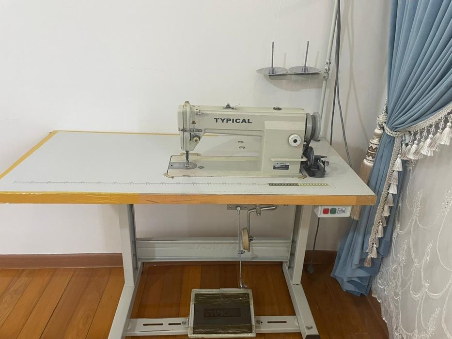 Швейная машина .