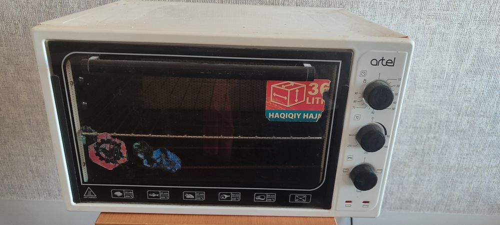 Продаю электрическую духовку Artel