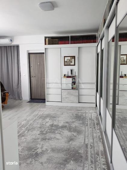 Apartament 2 camere, Chinteni – finisat, terasă 22 mp, parcare inclusă