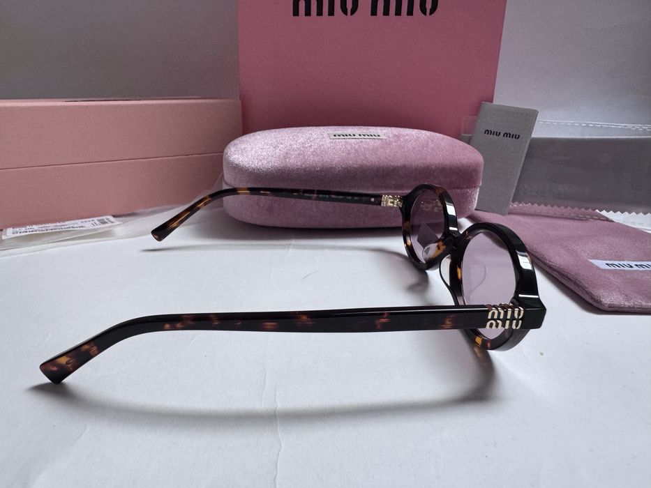 Ochelari de soare Miu Miu Oval SMU04Z 50-18 140, Noi