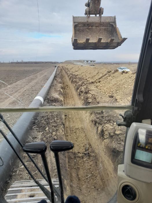 Inchirieri utilaje constructii Închiriez Excavator pe Pneuri – Prestări Servicii în Construcții și Terasamente