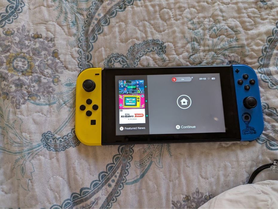 Продаю Nintendo switch плюс с играми