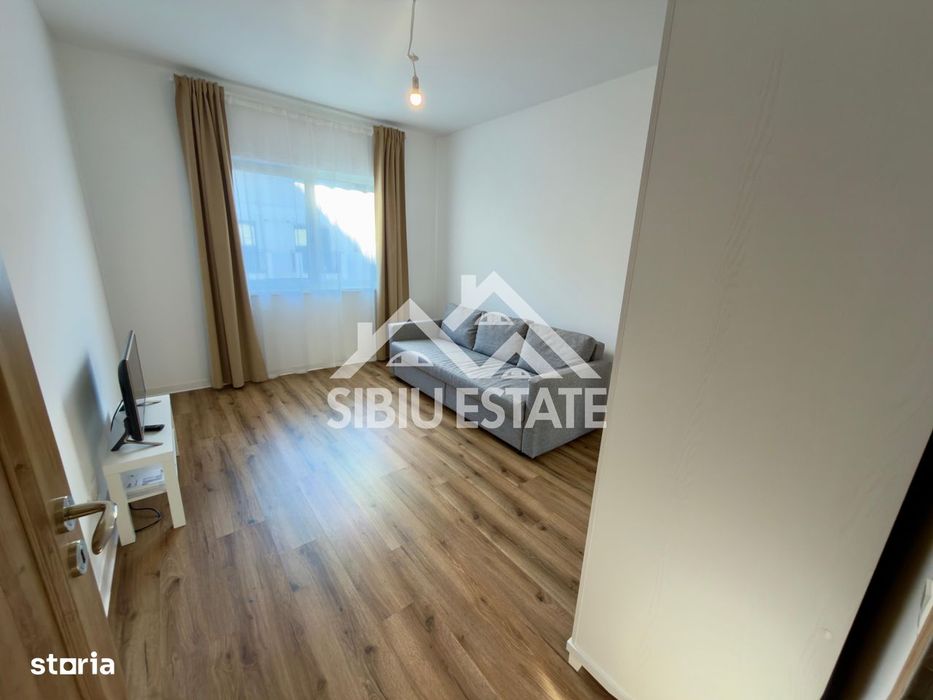 Studio mobilat, utilat, de vânzare în Șelimbăr cu parcare și boxă