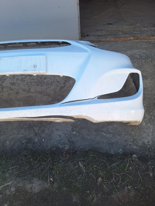 Бампер с ришоткой б.у