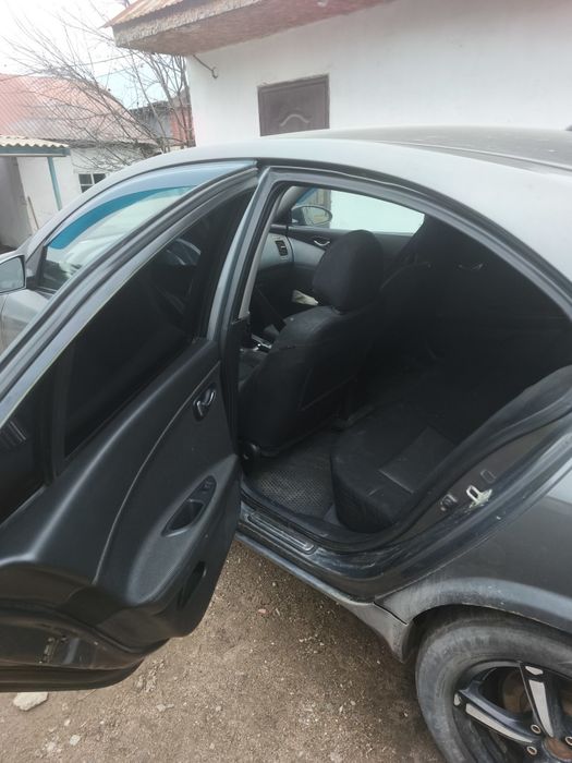 Ниссан примера Р12