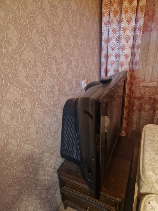 Отдам телевизор 58х77