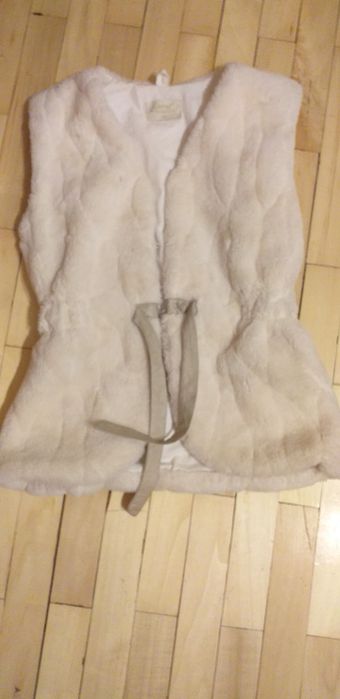 Пухен елек 140р.р на фирма Контраст