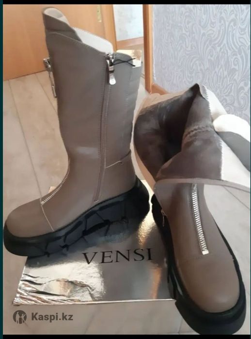 Продам кожаные сапоги