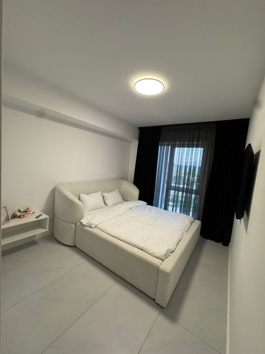 Chirie apartament 2 camere + living, cu parcare, in bloc nou nufarul