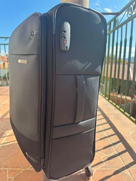 Черен куфар Samsonite с подарък сак Nike