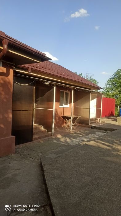 Casa plus spațiu comercial plus teren