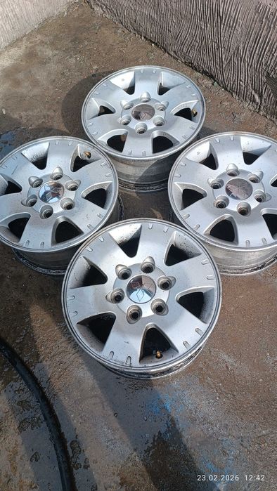 Комплект оригинальных дисков на Митсубиси Паджеро R16.