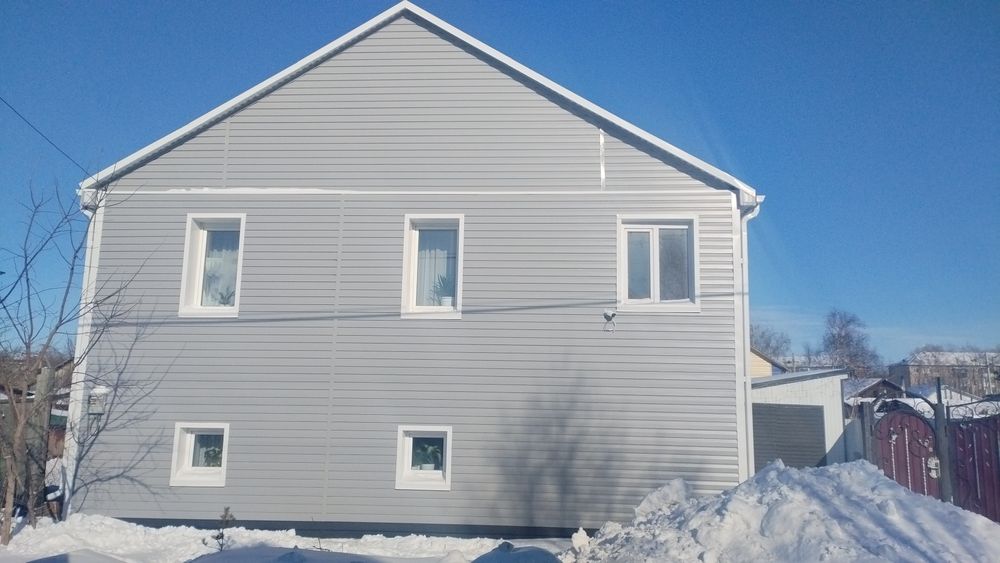 Обшивка фасада сайдингом, профлистом