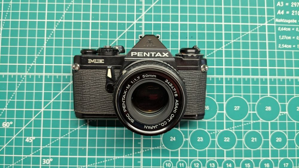Pentax Olympus Canon Minolta