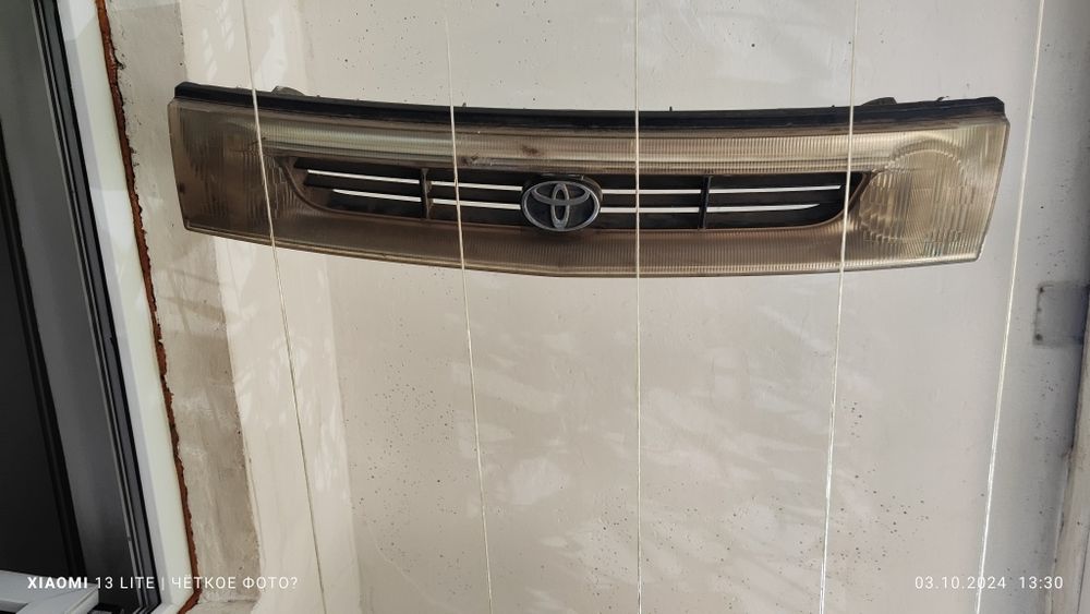 Решётка радиатора Тайота Эмина Эстима с ПТФ