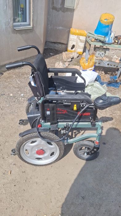 Инвалидная коляска электродвигателем