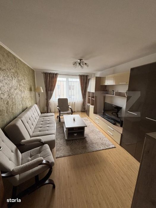 Apartament de vanzare - 3 camere - complet mobilat si utilat - Zona Tu — fotografia 1