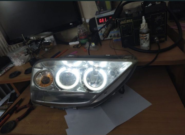 Faruri  logan 2004-2008 cu lupa si angel eyes