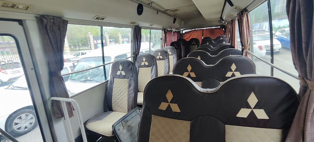 Mitsubishi Fuso  2008 xolati yaxshi 24 mesta