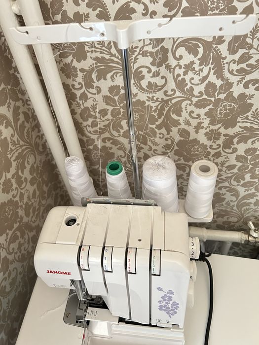Оверлог janome.