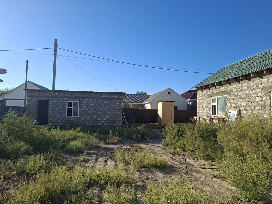Курилкино, недостроенным домом