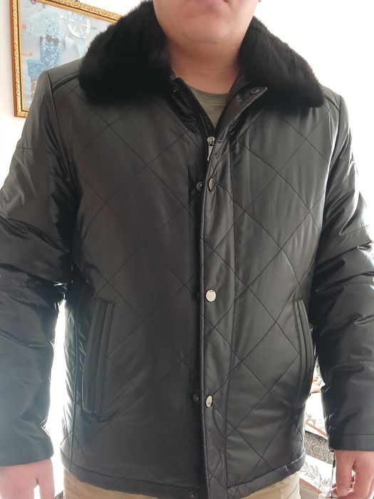 Продам зимний пуховик с норковым воратником