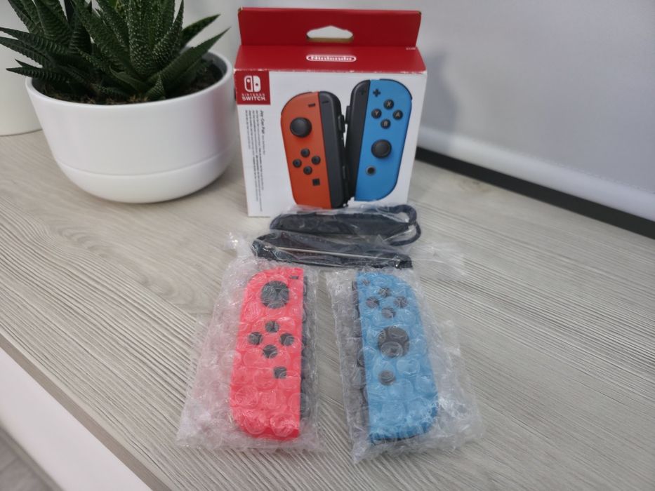 Set Nintendo Joycons, rosu-albastru, noi