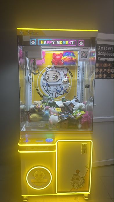 автомат с игрушками типа “хватайка”