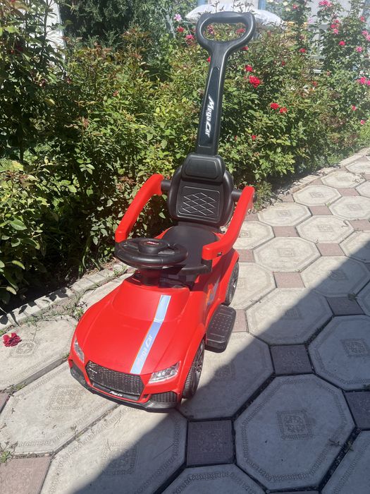 Детская машинка толкунок