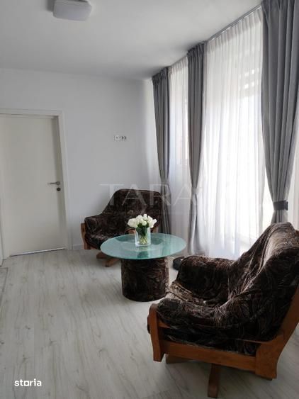 Apartament 2 camere, Chinteni – finisat, terasă 22 mp, parcare inclusă
