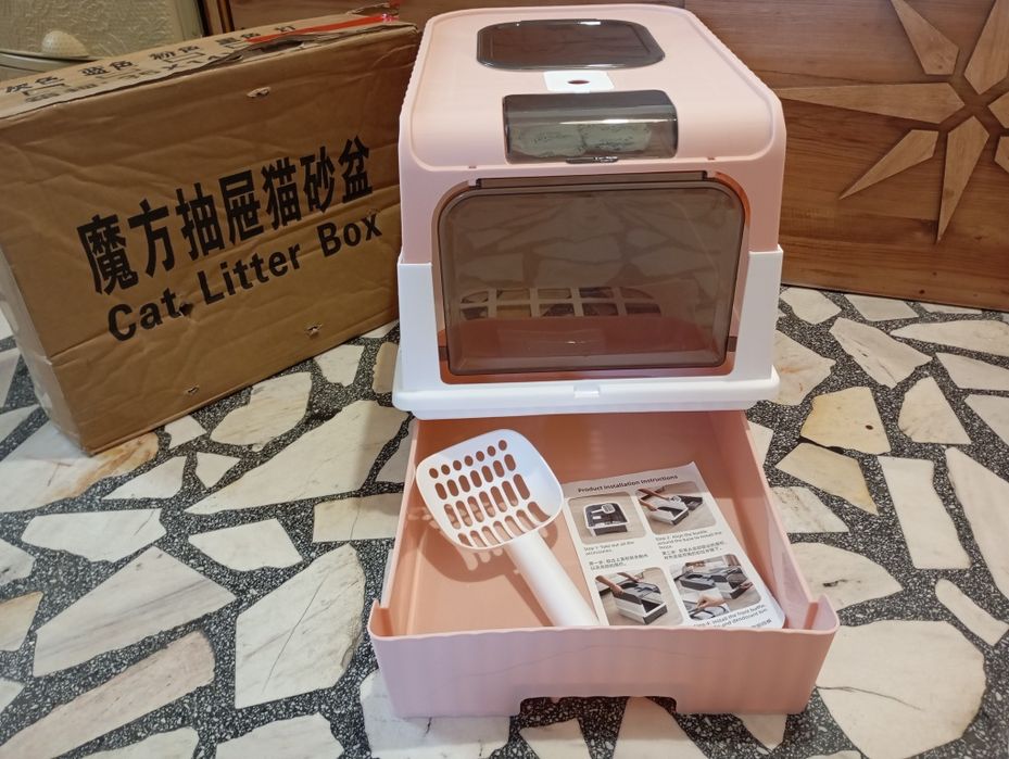 Затворена котешка тоалетна