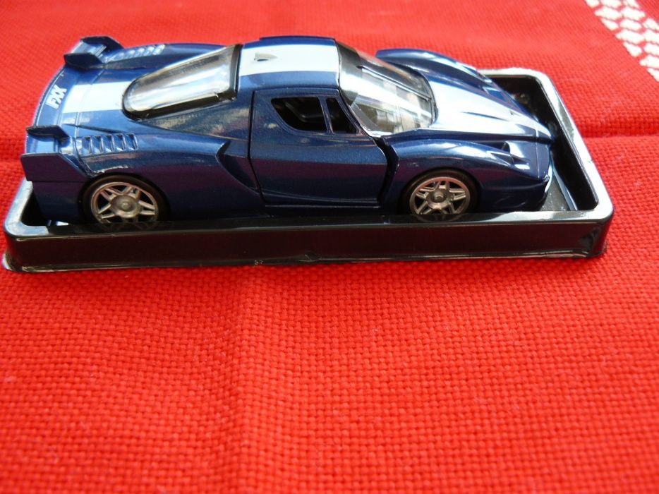Macheta Auto FERRARI FXX Noua,Metalica,Scara 1:43,Produs De AmerCom