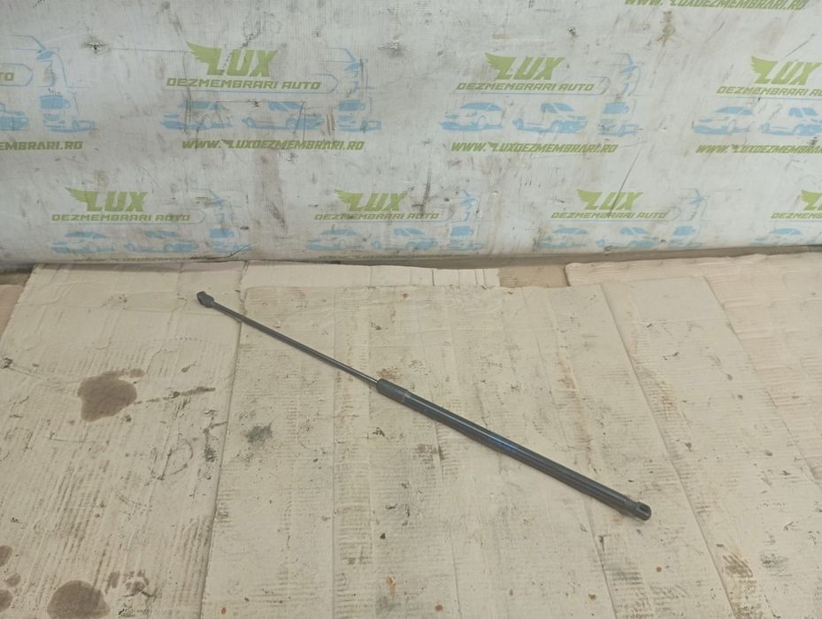 Amortizor capota 5k0823359d Volkswagen Golf 6 (2008 - 2015)