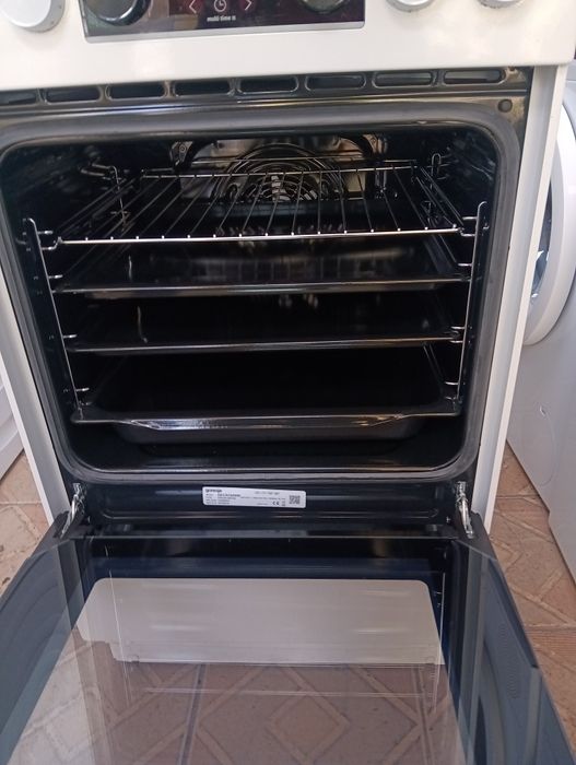 Тясна 50 см печка с керамичен плот Gorenje  с две години Гаранция!