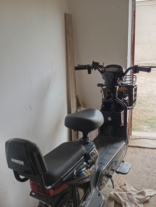 Скутер на тараза