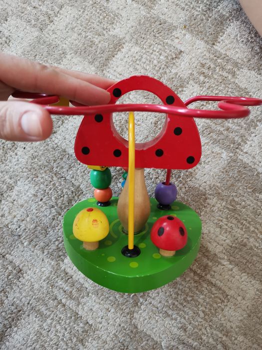 Деревянная развивающая игрушка.