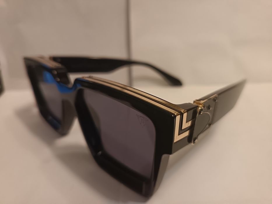 Дизайнерски слънчеви очила