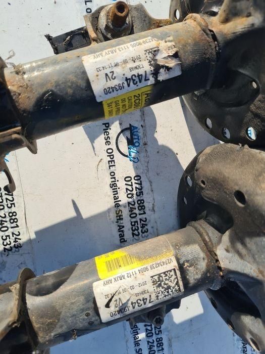 Amortizor cu arc stanga dreapta fata Chevrolet Aveo T300 1.2 benzina;