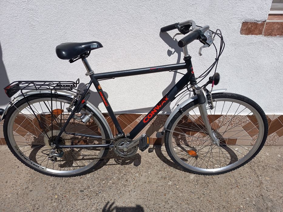 Vând Bicicleta bărbătească CONWAY cadru aluminiu Roți 28 inch echipată full Shimano