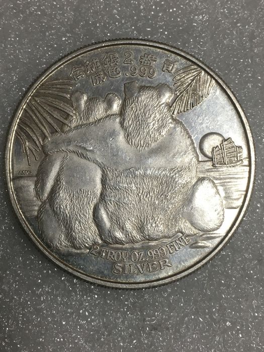 Серебрянная двух унцовка