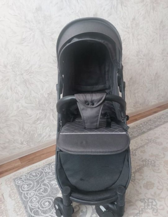 Детская прогулочная коляска