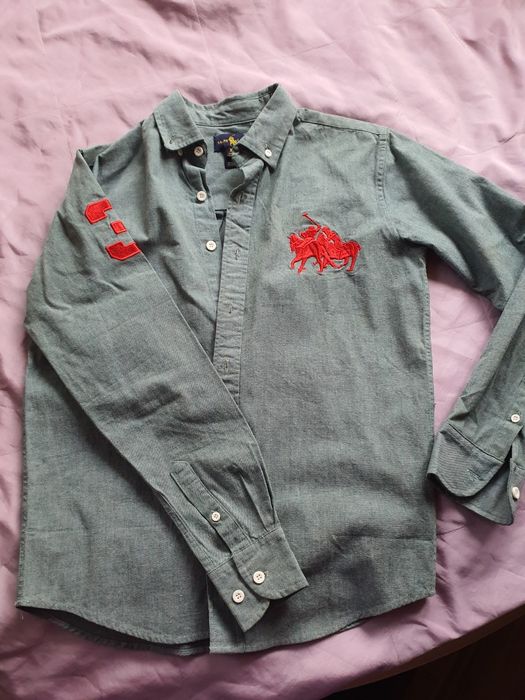 Рубашка Поло новая на мальчика 10 лет.