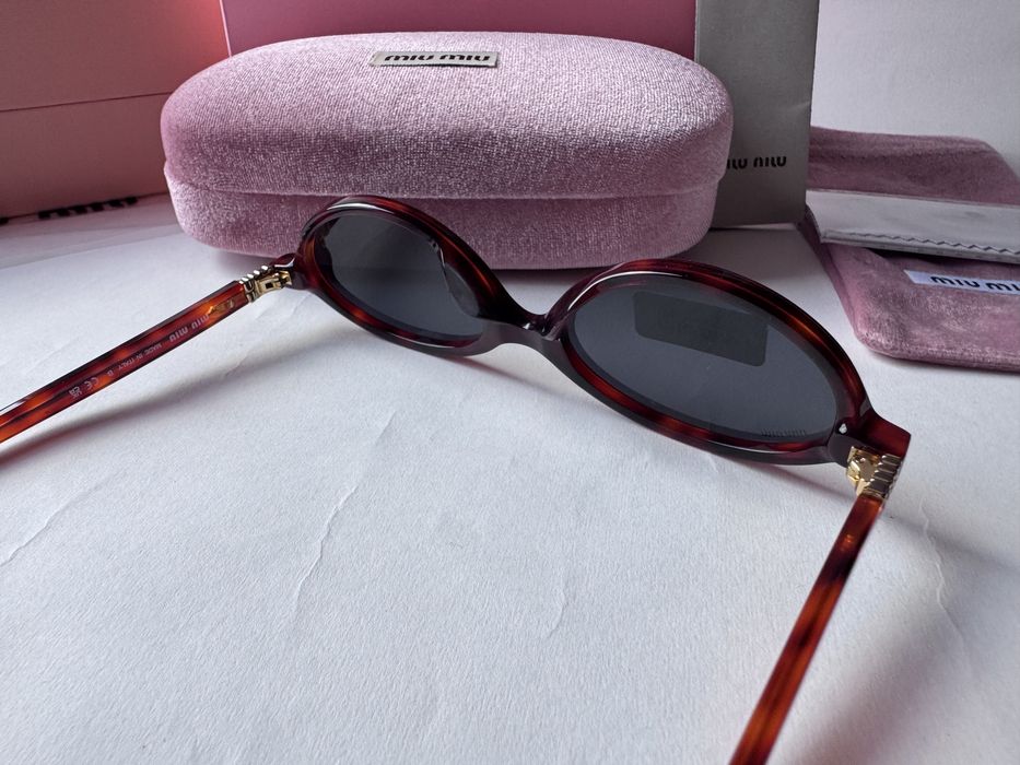 Ochelari de soare Miu Miu Oval SMU04Z 50-18 140, Noi