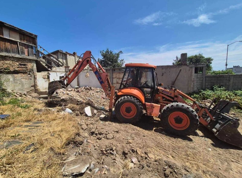 Услуги с комбиниран багер