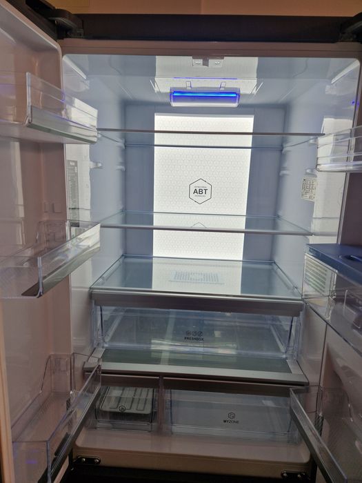 Хладилнис с фризер Haier A++ 70 см Нов