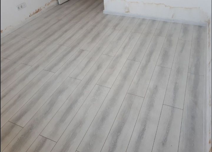 Укладка ламината установка плинтуса