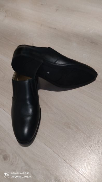 Новые мужские туфли.