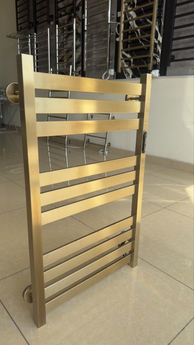 Золотой электрический полотенцесушитель от производителя