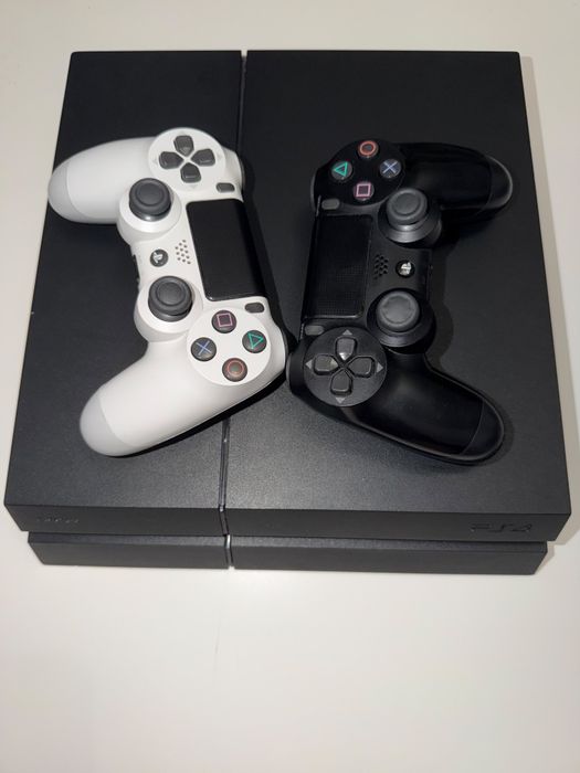 PS4 1TB + 2 manete originale + 10 jocuri in  stare foarte bună